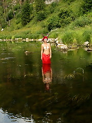 With Horns In Red Dress In Shallow River