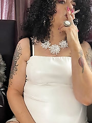 Aged cougar takes off provocative bra