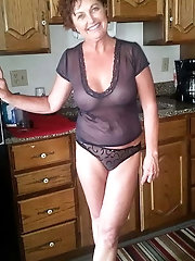 Aged businesswoman takes off hot clothes