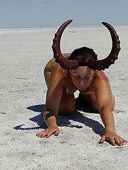 Standing on laps naked on the salt of the salt lake Elton