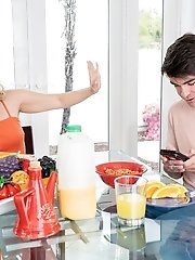 A blonde girl pleasures herself in a public nude beach setting