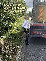 A mature woman is posing for a photoshoot and removing her underwear to reveal her desire for a penis